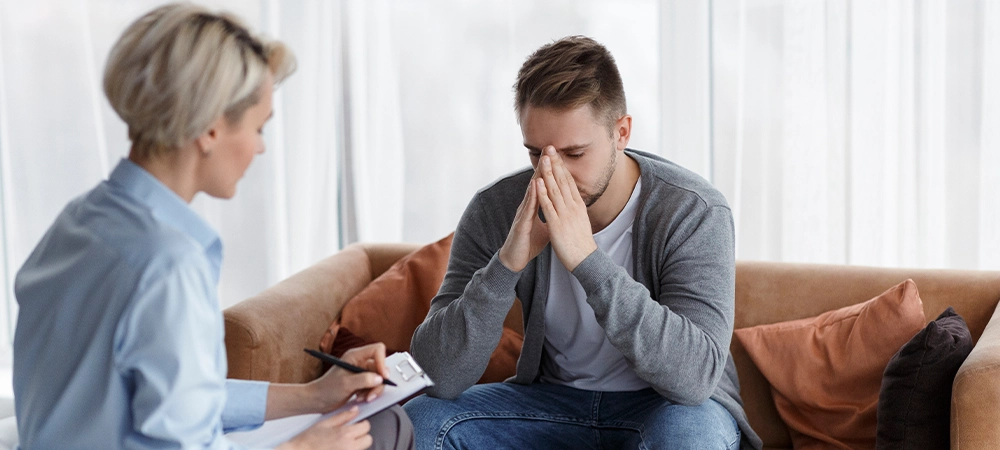 husband attending marriage counselling therapy session