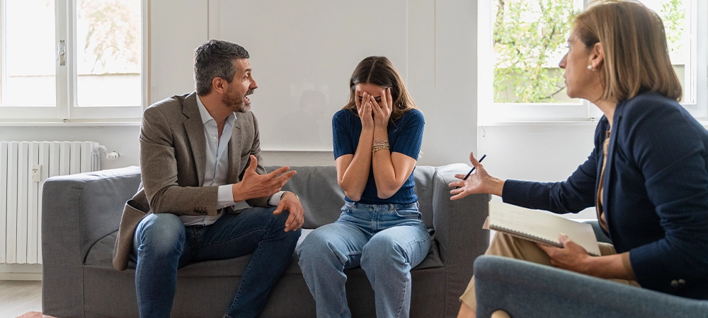 marriage counsellor resolving the conflicts between couple
